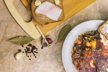 Cabbage soup, bacon with bread and garlic. Bread with sour cream.