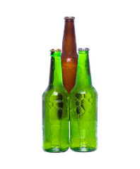 frozen glass beer bottles isolated on white background