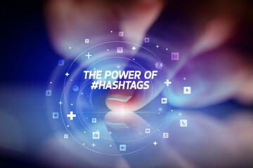 Finger touching tablet with social media icons concept