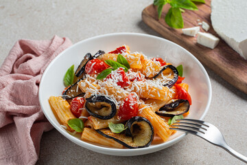 Pasta penne with eggplant, tomato sauce, basil, served with grated ricotta salata cheese. Pasta...
