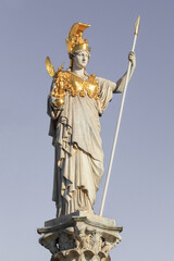 The statue of Pallas Athena on gray background Vienna, Austria