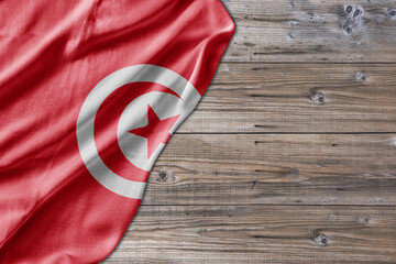 Wooden pattern old nature table board with Tunisia flag