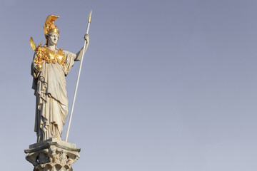 The statue of Pallas Athena on gray background with copy space for your design.Vienna, Austria.