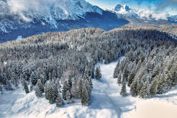 Fototapeta na wymiar Wetterstein - winter landscape with snow covered mountains and forest 