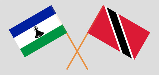 Crossed flags of Lesotho and Trinidad and Tobago. Official colors. Correct proportion.