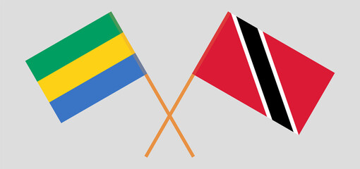 Crossed flags of Gabon and Trinidad and Tobago. Official colors. Correct proportion
