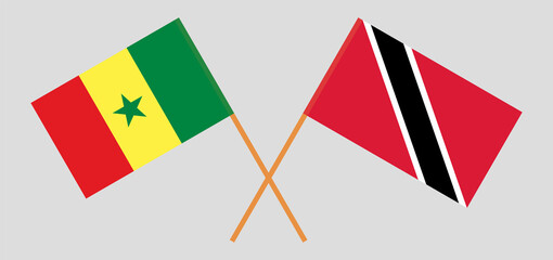 Crossed flags of Senegal and Trinidad and Tobago. Official colors. Correct proportion