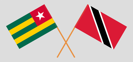 Crossed flags of Togo and Trinidad and Tobago. Official colors. Correct proportion