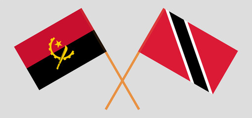 Crossed flags of Angola and Trinidad and Tobago. Official colors. Correct proportion