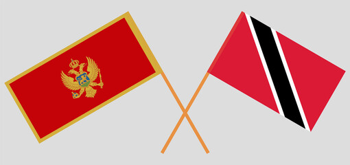 Crossed flags of Montenegro and Trinidad and Tobago. Official colors. Correct proportion