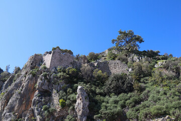 ancient fortification of the city Olympos on the mountain near Cirali village in Turkey