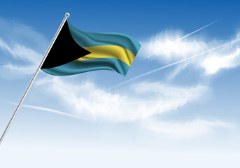 Flag of the Bahamas on a stick, clear sky in the background