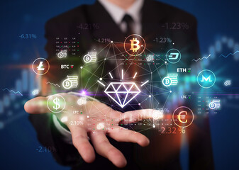 Businessman holding currency symbols