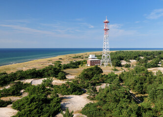 Fototapeta na wymiar Aerial View To A Radio Tower Close To The Baltic Sea Beach In Darsser Ort Germany On A Beautiful Sunny Summer Day With A Clear Blue Sky And A Few Clouds