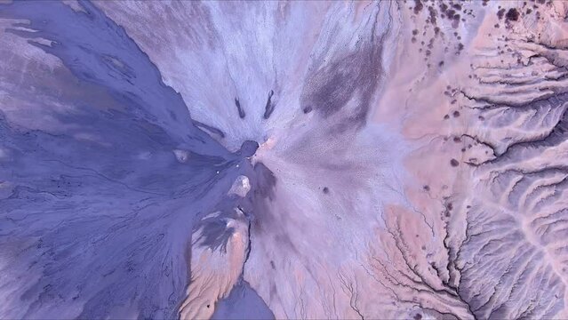 Aerial footage from drone with muddy volcano from Romanian mountains , Buzau county , Carpathian mountains , aerial landscape ,Paclele mici and Paclele Mari , vulcanii noroiosi 