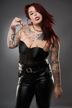 Glamour plus size model with tattoos