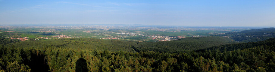 Obraz premium Panorma View From The Bismarck Tower To The Countryside Around Bad Duerkheim Germany On A Beautiful Sunny Summer Day With A Clear Blue Sky And A Few Clouds