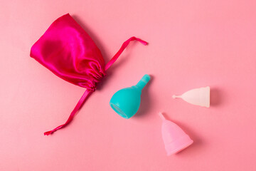 menstrual silicone cups different colors, shapes and capacity for menstruation cycle. Sustainable and comfortable menstruation cycle periods. Reusable eco friendly and zero waste hygiene products. 