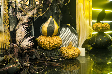 Spooky black Halloween decor with pumpkins decoration at Halloween party. Trick or treat in autumn...
