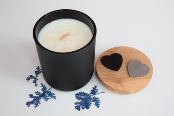 Handmade scented Aura candle with wooden lid and black and gray hearts with pressed flowers on...