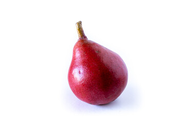 One red pear isolated on white background. Organic and natural products, healthy and wholesome food.