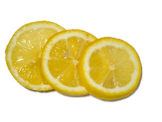 A sliced lemon   on a white background. Citrus on the table. Bright background. Healthy fortified food for a diet.