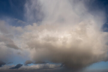 Blue cloudy sky. Nature background.