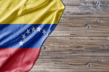 Wooden pattern old nature table board with Venezuela flag