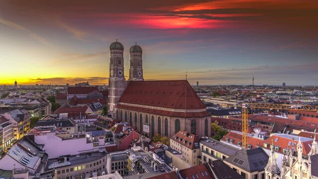 Munich skyline view at sunset, view of frauenkirche in old town marienplatz sqaure munich germany cityscape colored sky.