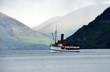 Shot of Steamboat sailing in Lake Watakipu, Queenstown, South Island, New Zealand