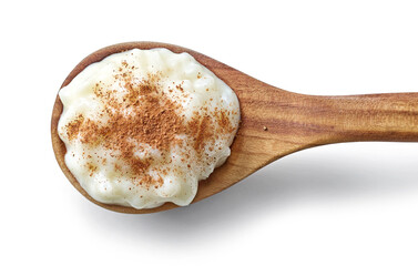 wooden spoon of rice pudding