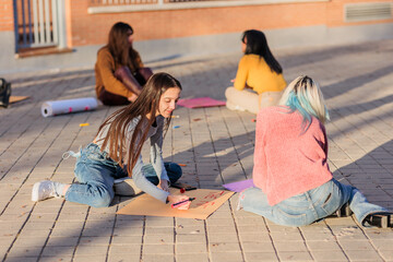 Multicultural group preparing together feminist movement womens international day 8m