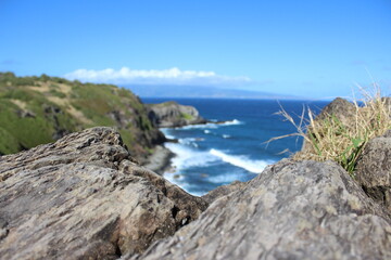 Fototapeta na wymiar Island cliffs and ocean