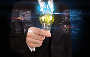 Businessman holding a light bulb, online security concept