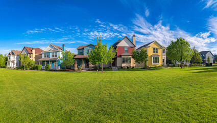 Facade of colorful traditional two-storey houses at Daybreak, Utah