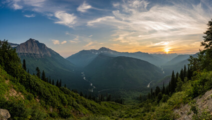 McDonald Creek Flows The Glacier Wall At Sunset