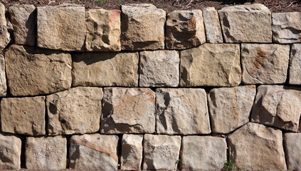 Full frame close-up view of an old retainer wall made of large stones