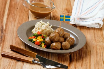 Swedish Meatball with Mushroom Brown Sauce and Boiled Vegetable, Served with Creamy Mashed Potato