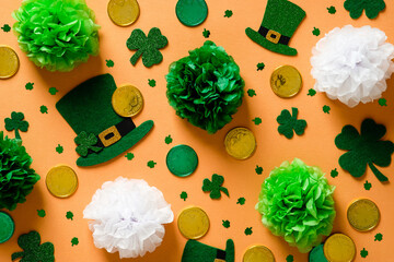 Saint Patrick's Day concept. Shamrock clover leaves, green hats of leprechauns, green and gold...