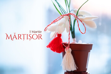 Snowdrops with martisor talisman, Traditional accessory for the Spring Festival or Baba Marta in...