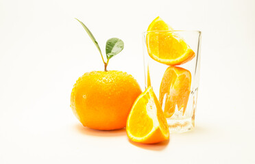 Group of oranges and leaves. Fresh-looking yellow fruit isolated on a white background. Fruits with vitamins and good health focus on specific points. Advertising concept and healthy, space for text