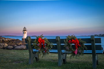wreaths on a bench at lighthouse