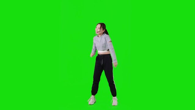 ダンスする女性　クロマキー合成用グリーンバック 