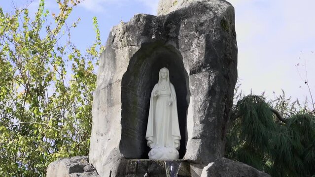 The White Virgin Mary Statue Water Fountain