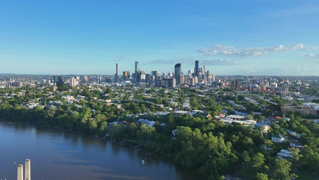 Aerial starting with a view of Brisbane City  to a reveal of the Eleanor Schonell Bridge or better known as the green bridge.