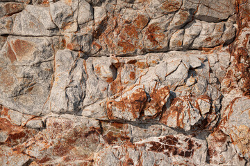 Rough granite stone surface for background, texture