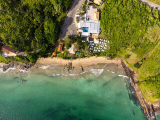 Amazing paradise beach with turquoise water seen from above by a drone - Praia Brava, Armação de Búzios, Rio de Janeiro, Brazil