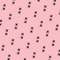 Pattern of black geometric shapes in retro, memphis 80s 90s style. Crosses shapes on pink background. Vintage abstract background