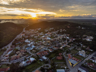 Drone view of the sunset in beautiful coastal city - Armação de Búzios, Rio de Janeiro, Brazil