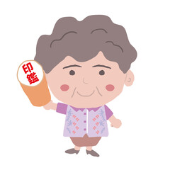 沖縄のかりゆしウェアを着た中年女性が印鑑を持っている